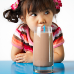 Young Girl Drinking Chocolate MilkR